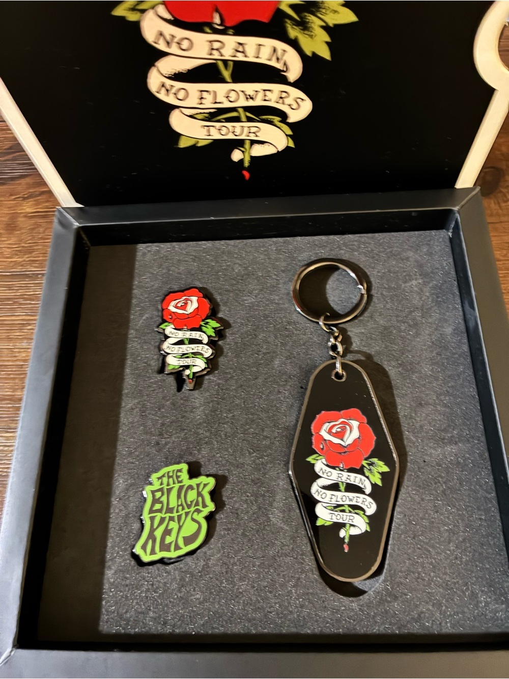 Black Keys merch from“No Rain No Flowers"  tour Keychain and Pin Set